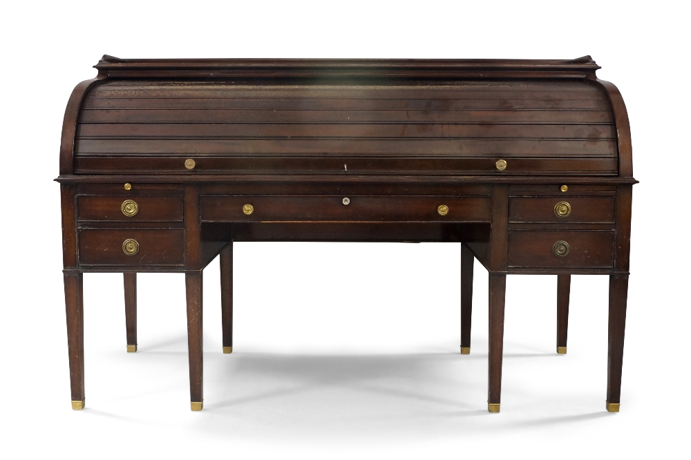 A large Regency style mahogany roll top bureau, early 20th century, ebony strung, the galleried