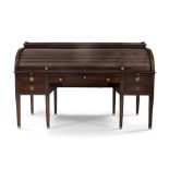 A large Regency style mahogany roll top bureau, early 20th century, ebony strung, the galleried