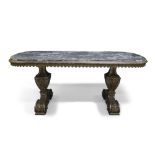 A large Italian marble top dining table, early 20th century, the oblong marble top raised on twin