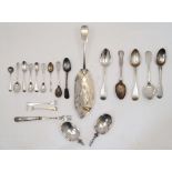 A group of silver, to include: three Irish silver fiddle pattern spoons and two condiment spoons,