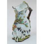 A Chelsea style goat and bee jug, probably 19th century, of typical form with applied foliage and