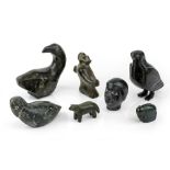 A group of six Inuit soapstone carvings, late 20th century, comprising: three birds, a figure and