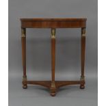 A French Empire style mahogany demi-lune console table, late 20th century, raised on square tapering
