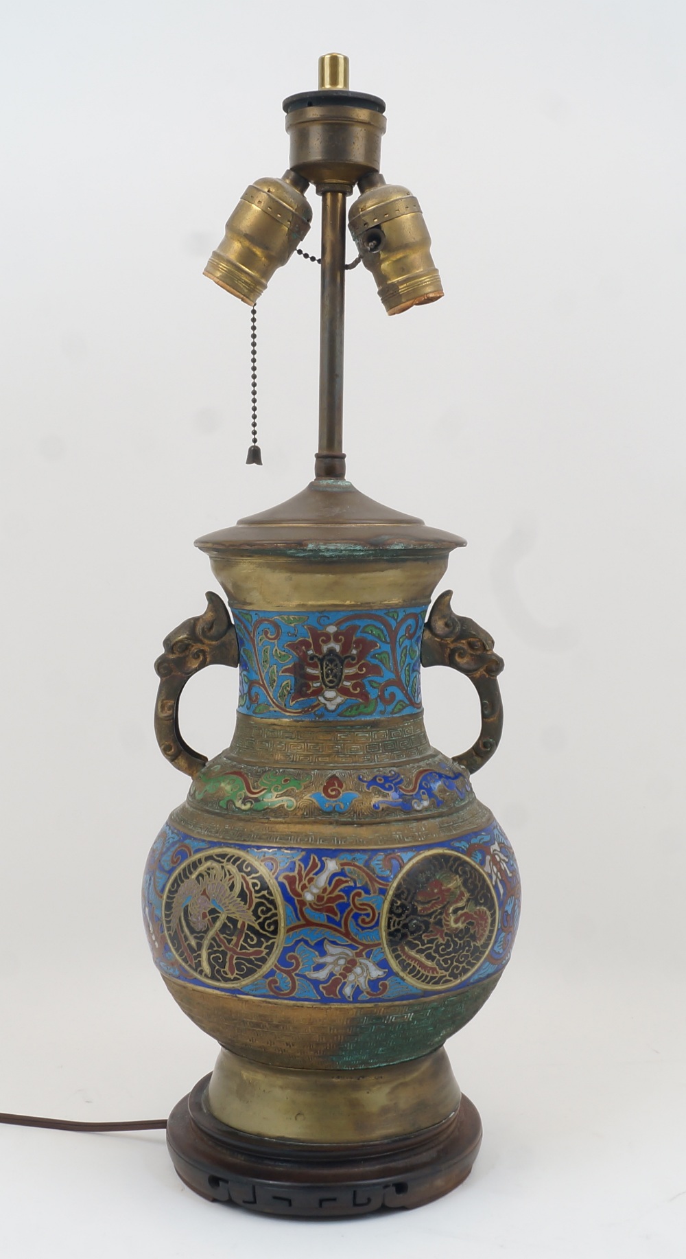 A Chinese cloisonne twin handled lamp base, 20th century, the exterior with panels of foliate motifs