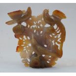 A Chinese agate 'birds' carving, 20th century, pierced and carved with three birds perched on