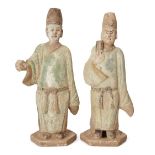 Two Chinese green-glazed pottery tomb attendant figures, Ming Dynasty, the tallest 33cm high (2).