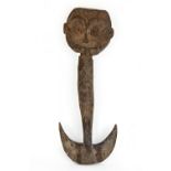 A Sepik carved wooden suspension hook, Papua New Guinea, Melanesia, late 19th/early 20th century,