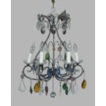 A modern metalwork and glass six-light chandelier, of open cage form, hung with coloured and clear