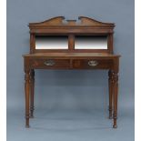 A Regency style mahogany side table, early 20th century, the mirrored back superstructure with