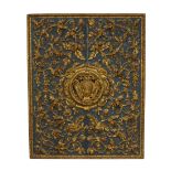 A large Continental carved gilt wood panel, 18th century, the central carved crest surrounded by