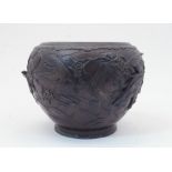 A Japanese bronze bowl, Meiji period, late 19th / 20th century, cast with high relief birds and