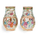 A pair of Chinese Canton famille rose porcelain vases, 19th century, each of pear shape form with