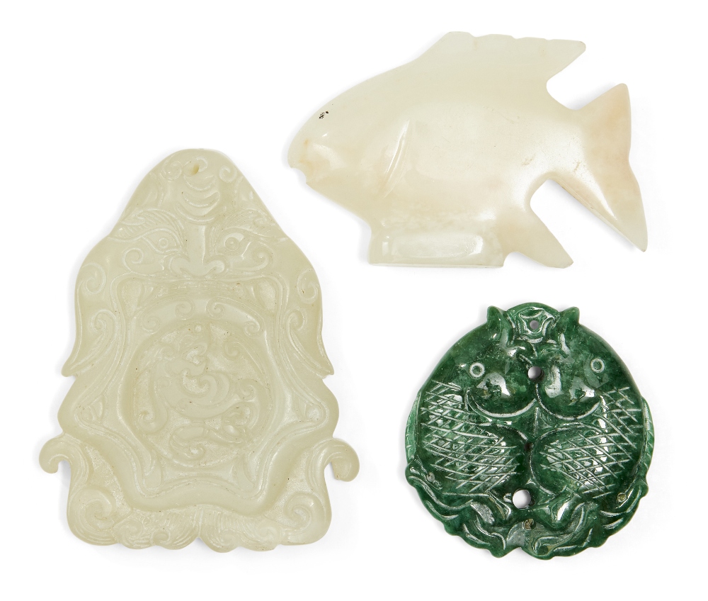 A group of Chinese hardstone carvings, 19th-20th century, including a white jade carved fish with