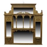 A Victorian gilt wood and gesso overmantel mirror, c.1860, the carved and moulded cornice above