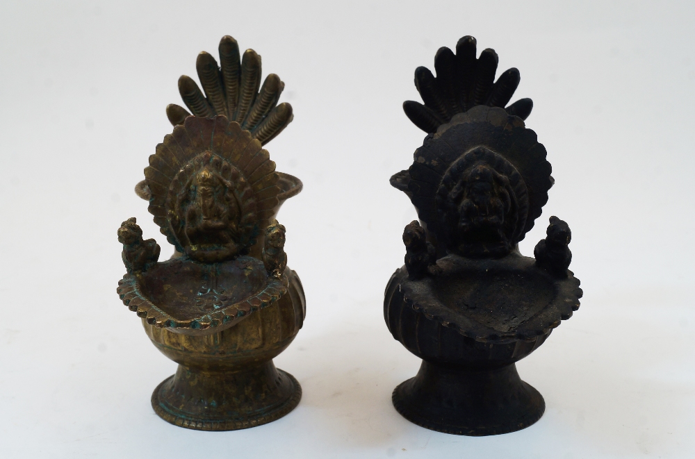 A bronze offering vessel with figure of Ganesha, Nepal, 17th-18th century, on a played foot, the