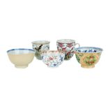 Four Chinese tea bowls and a coffee cup, Kangxi period and later, comprising two Kangxi tea bowls of
