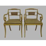 A set of six Regency style cream painted dining chairs, 20th century, parcel gilt with scroll
