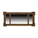 A Victorian parcel gilt yew wood sectional mirror, with egg and dart border, 51cm x 112cm