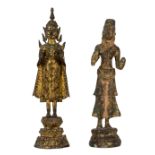 Two Burmese bronze figures of deities, 19th century, one with traces of gilding, each depicted