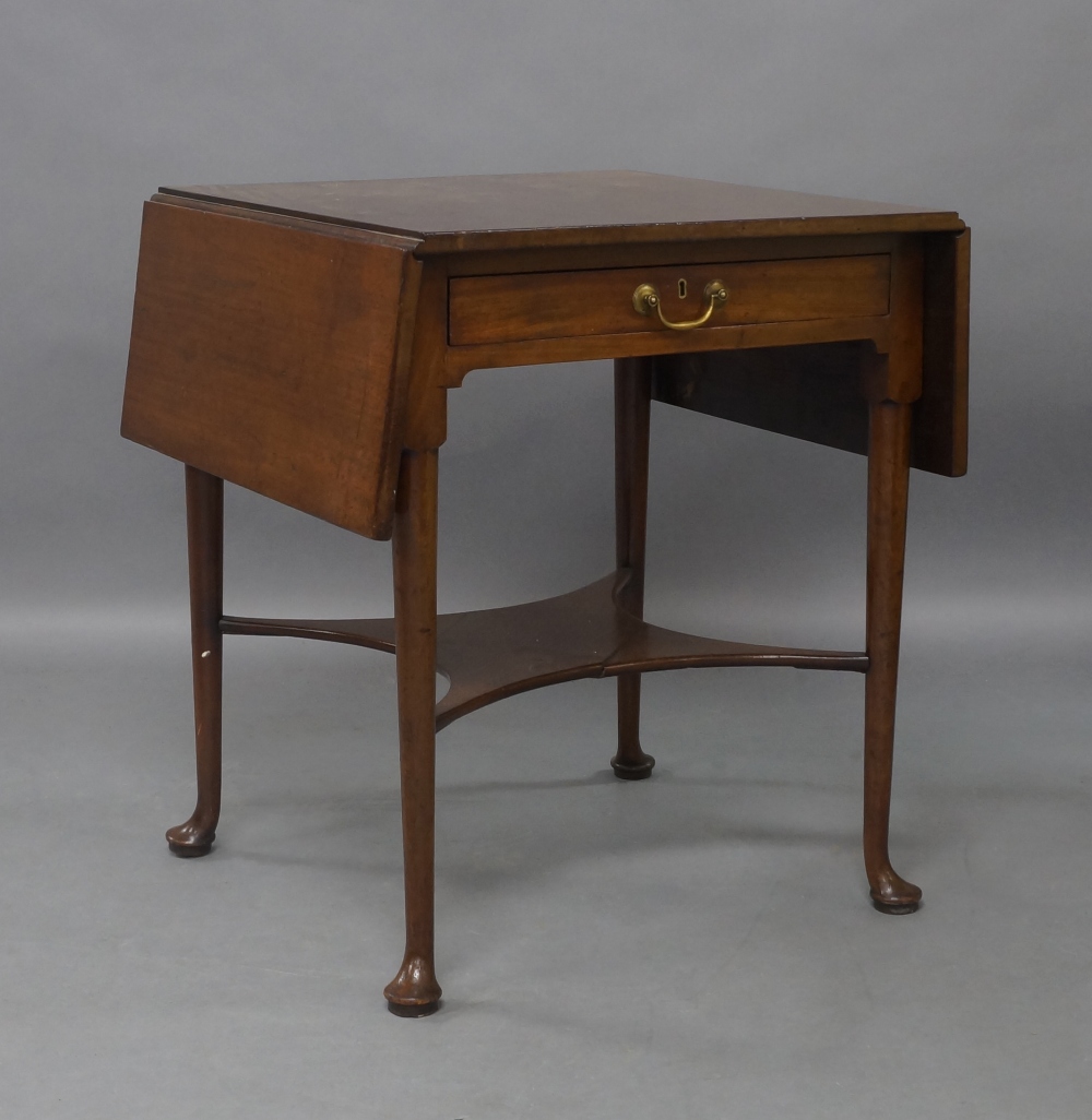 A George III mahogany pembroke table, the square top with drop leaves, above single drawer, raised