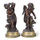 A pair of French bronze models of Cupid and a Young Girl, possibly Psyche, in the manner of Louis-