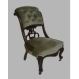 A Victorian mahogany nursing chair, with button back velour upholstery, raised on carved cabriole