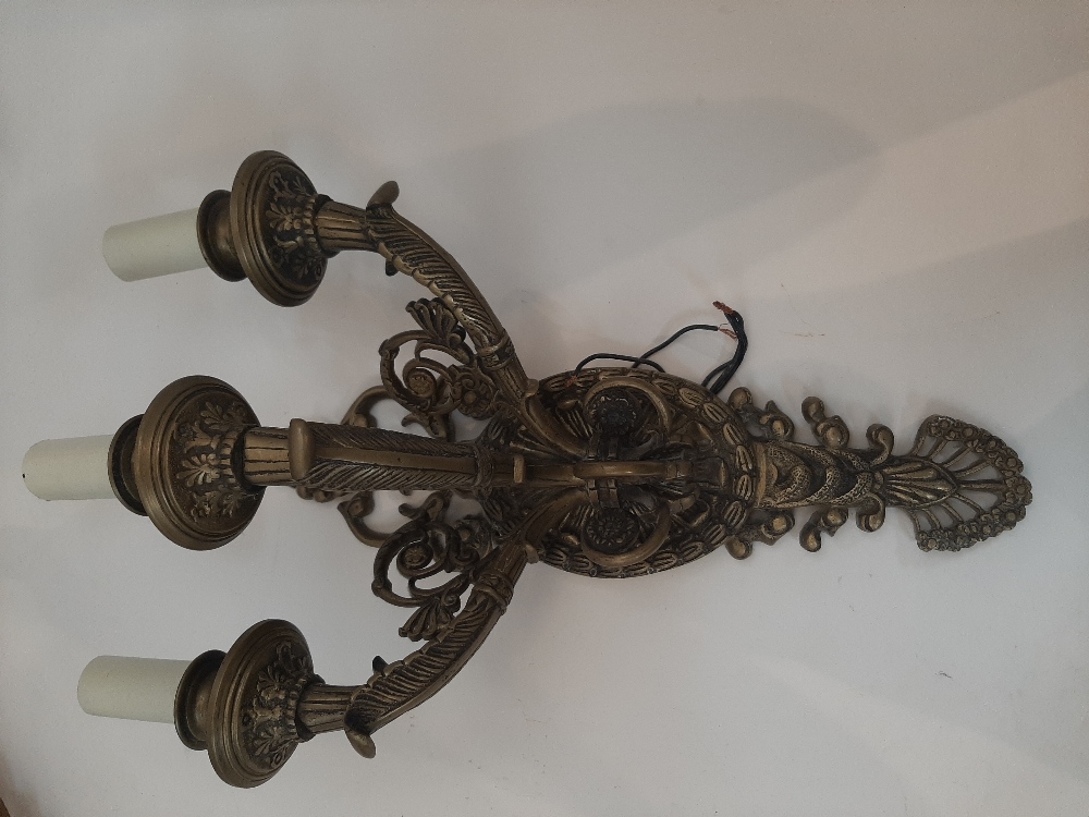 A French gilt-bronze twin-light candelabrum, late 19th century, converted to electricity, with tri- - Image 8 of 16