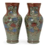 A pair of Chinese stoneware celadon vases, 19th century, each enamelled with peonies and