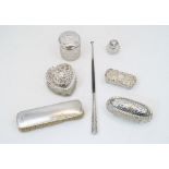 A group of silver, comprising: five silver mounted glass vanity jars, comprising a hair tidy jar,