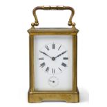 A French gilt-brass carriage clock, late 19th century, the corniche case with swing handle, the