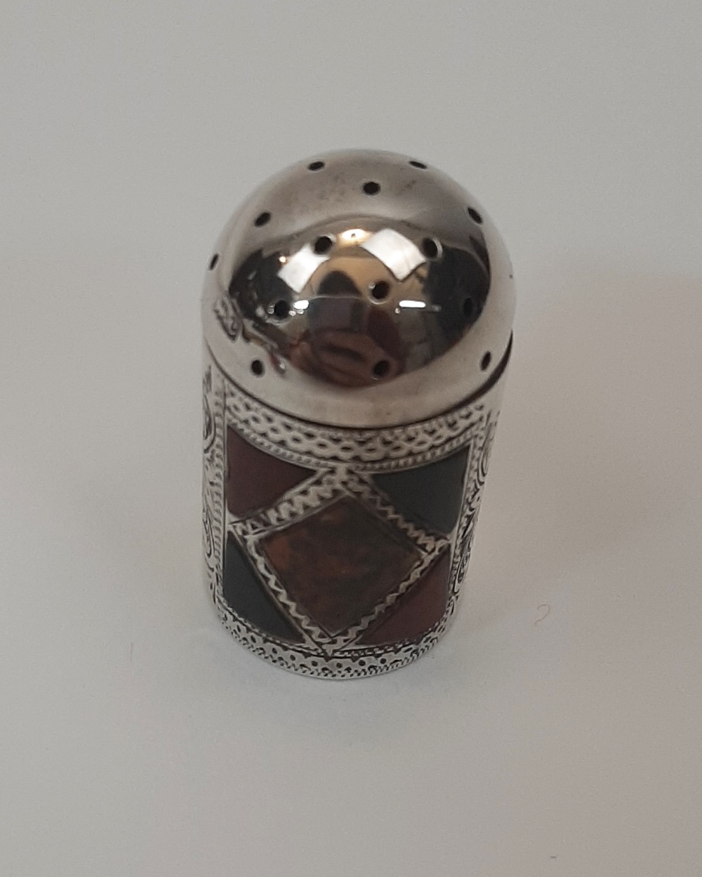 A novelty silver pepper, Birmingham, 1902, makers mark rubbed, with hardstone mounts and scroll - Image 2 of 2