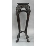 A Chinese carved and pierced hardwood jardinière stand, early 20th century, with marble top, 90cm