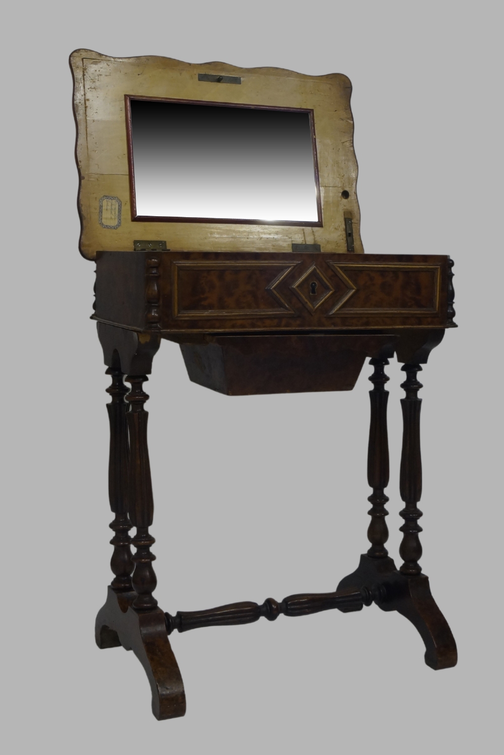 A French burr wood boudoir table, late19th/early 20th century, hinged lid enclosing mirror and - Image 2 of 3