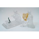 Two modern St Louis glass sculptures, comprising: the snake charmer and a harp player, the crouching