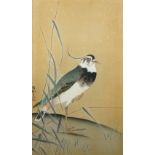 A Japanese watercolour painting of a stork, 20th century, depicting standing on one leg in a