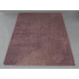 A contemporary rug, early 20th century, with deep pile, purple ground, 232cm x 171cmPlease refer