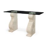 A variegated stone and glass console table, the bevelled glass top raised on two S scroll