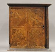 An 18th century spice cupboard (lacking interior). 42 cm wide.