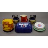 A quantity of pub advertising jugs and ashtrays.