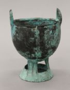 An archaistic type Chinese bronze vase. 18 cm high.