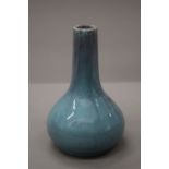 A flambe glazed vase. 19.5 cm high.