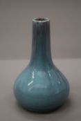 A flambe glazed vase. 19.5 cm high.
