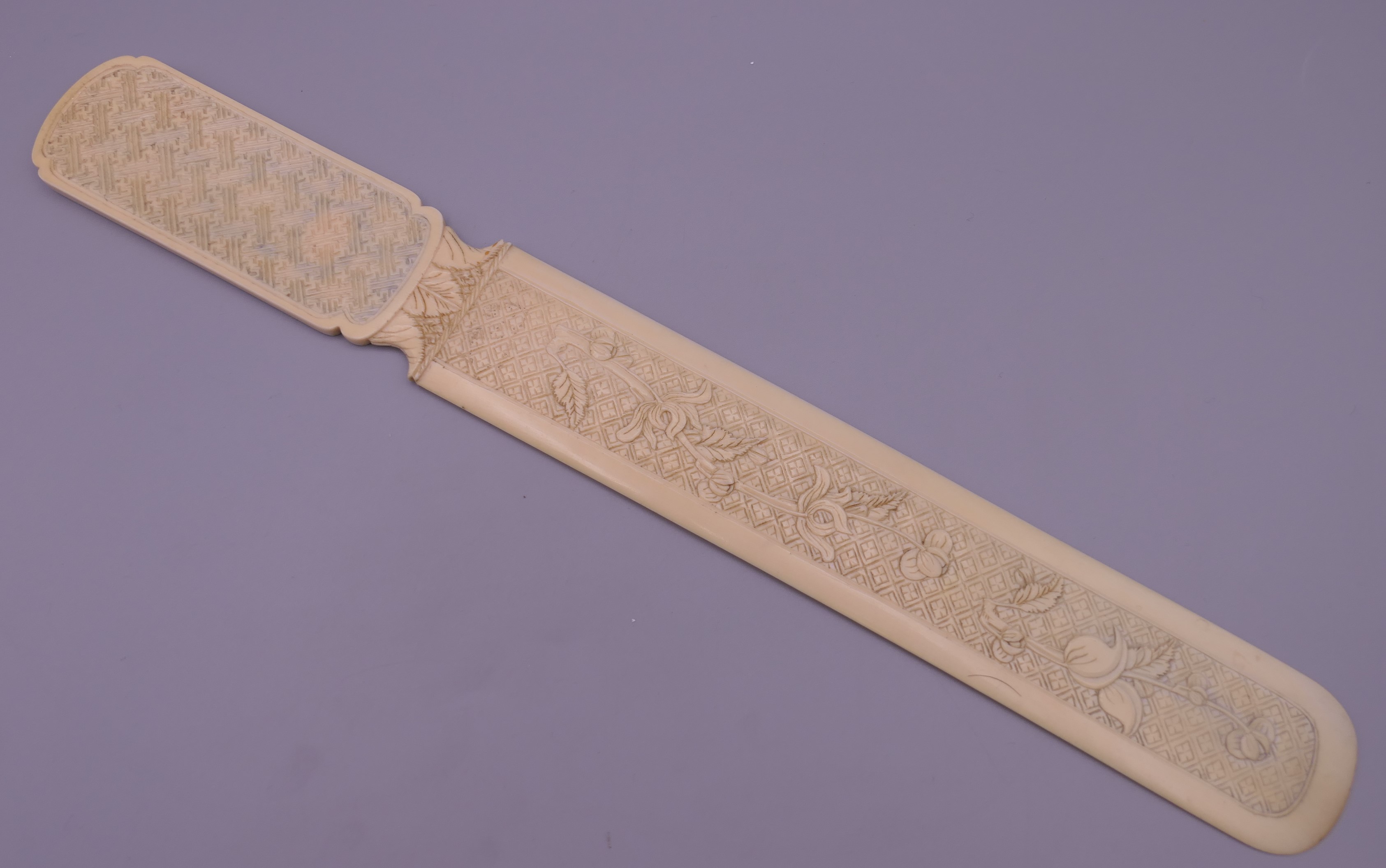 A 19th century Canton carved ivory letter opener. 32 cm long. 46.5g. - Image 2 of 10