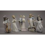 Three Lladro figures and two others. The largest 20.5 cm high.