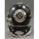 A black replica diver's helmet. 41 cm high.