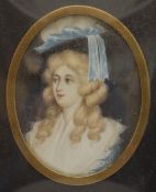 A 19th century miniature painting on ivory of a young lady, framed and glazed. 10.5 x 14 cm overall.