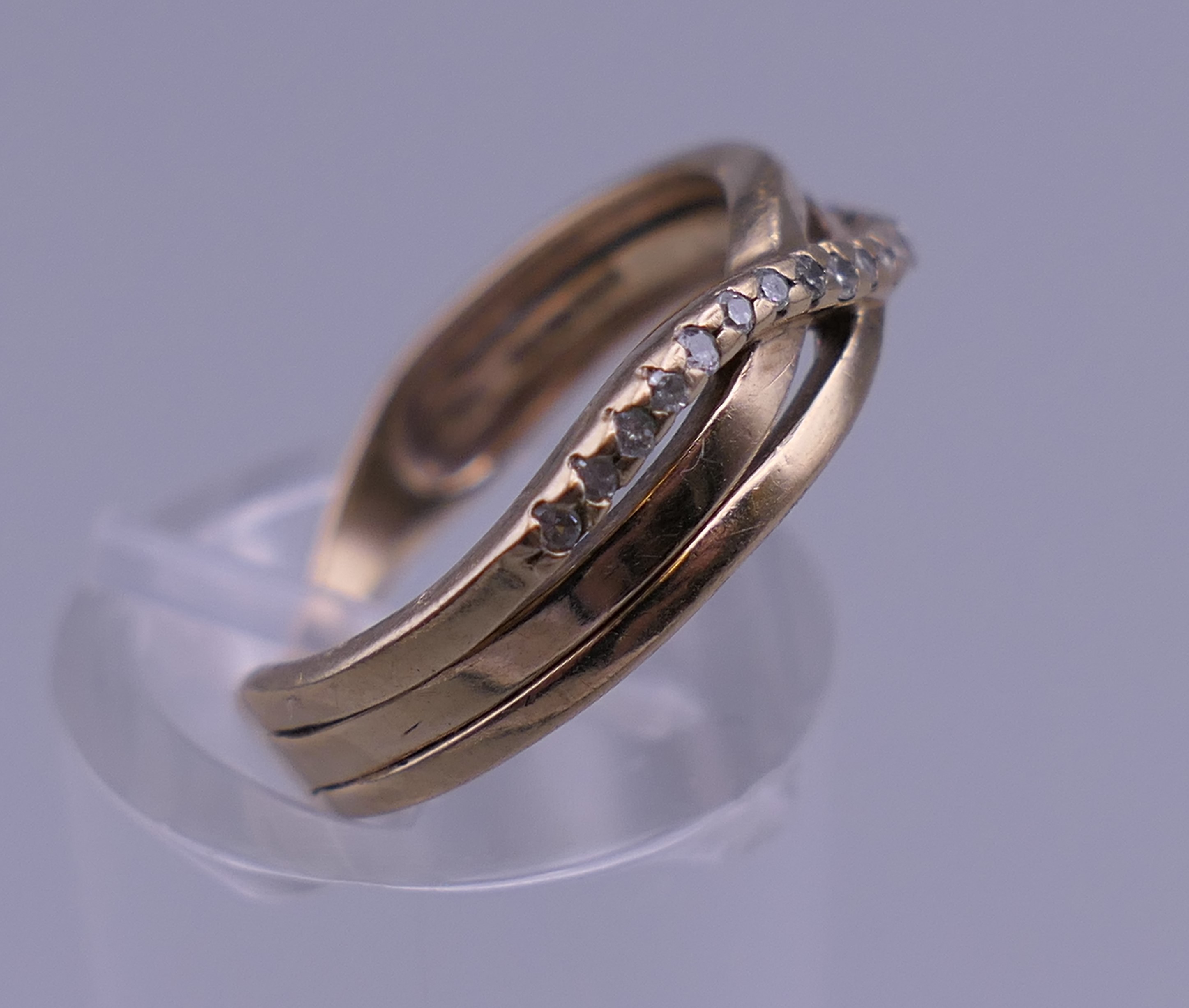 A 9 ct gold diamond ring. Ring size J/K. 2.4 grammes total weight. - Image 6 of 6