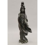 A fine 19th century Japanese bronze depicting Guanyin holding a scroll. 48 cm high.