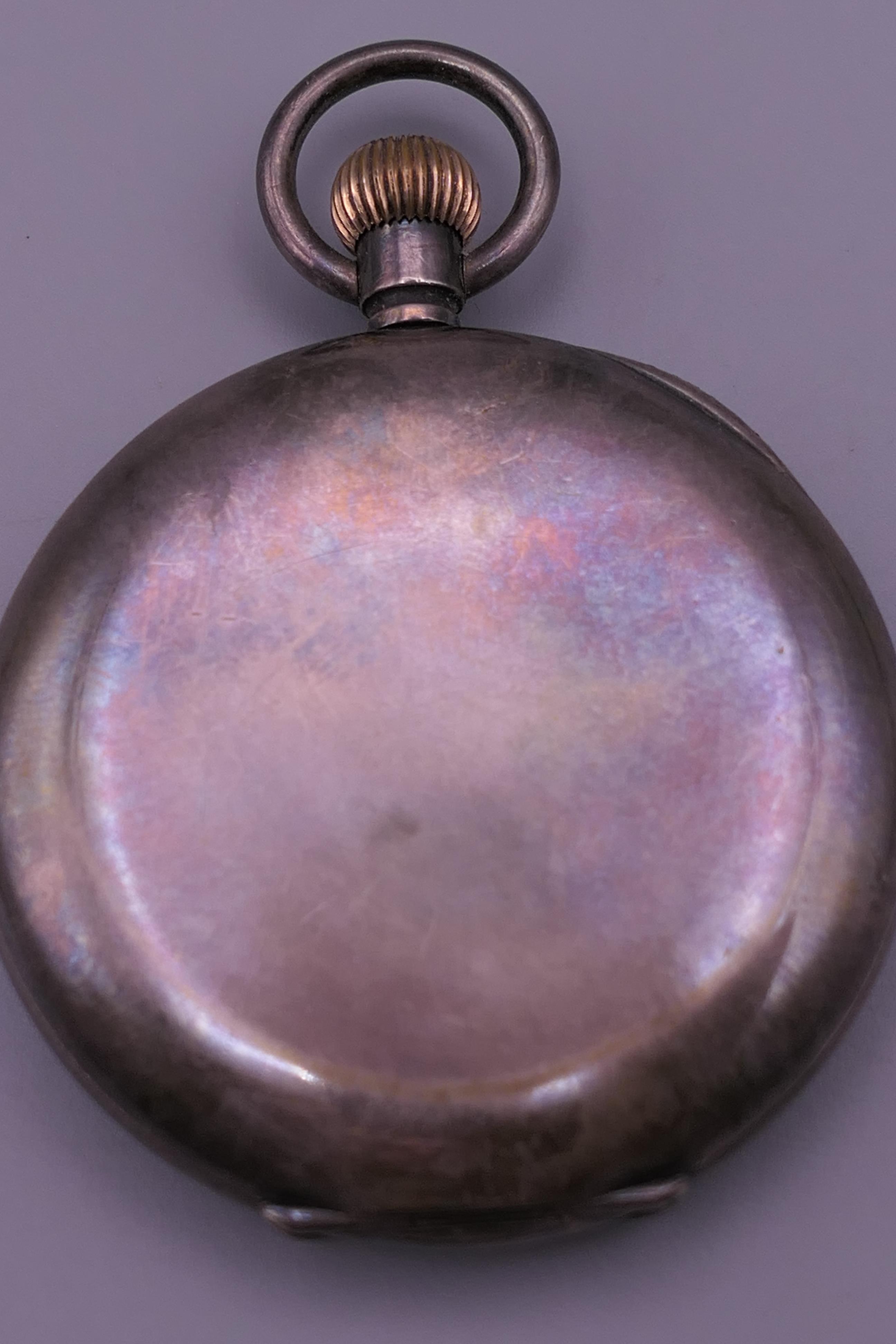 A silver pocket watch, a silver fob watch and a plated pocket watch. - Image 11 of 16