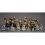 A quantity of Wade My Fair Ladies, Jon Hagora porcelain figures and Tetley Tea Folk, etc.